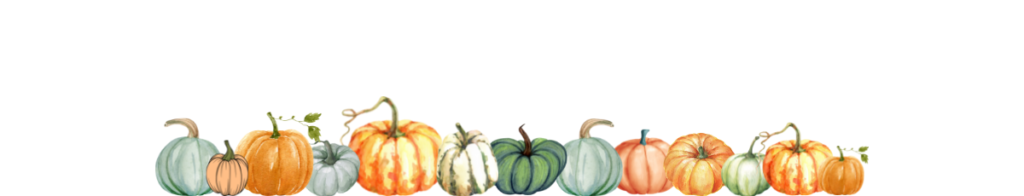 A row of different colored pumpkins.